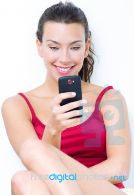 Beautiful Brunette Woman Looking The Mobile Stock Photo