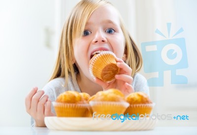 Beautiful Child Having Breakfast At Home Stock Photo