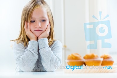 Beautiful Child Having Breakfast At Home Stock Photo