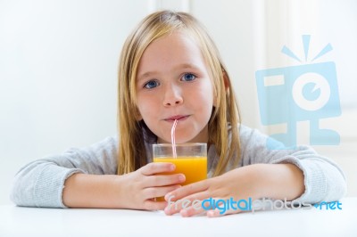 Beautiful Child Having Breakfast At Home Stock Photo