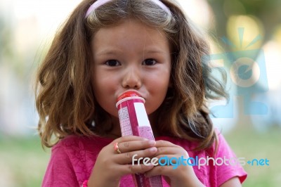 Beautiful Children Having Fun In The Park Stock Photo