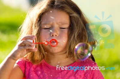 Beautiful Children Having Fun In The Park Stock Photo