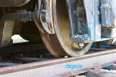 Beautiful Close-up Of The Old Train Wheels And The Road Stock Photo