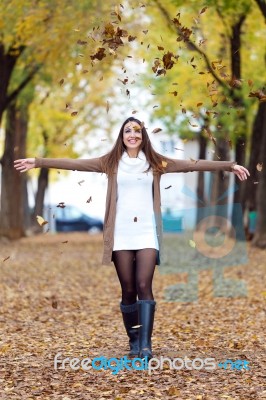 Beautiful Girl Having Fun In The Autumn Stock Photo