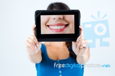 Beautiful Girl Holding A Picture Of A Mouth Smiling Stock Photo