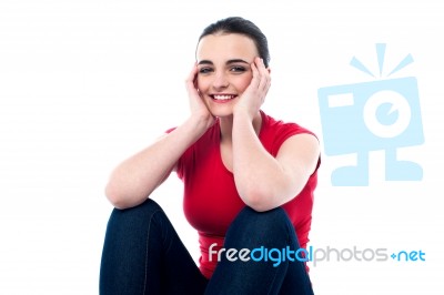 Beautiful Girl In Casuals, Sitting Idle Stock Photo