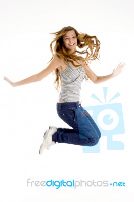 Beautiful Girl Jumping Stock Photo