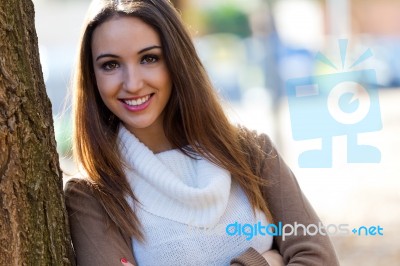 Beautiful Girl Looking At Camera In Autumn Stock Photo