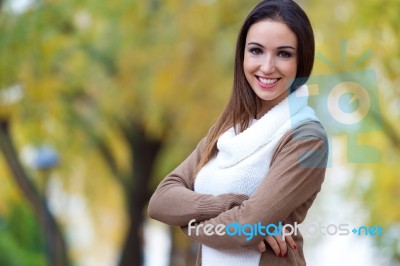 Beautiful Girl Looking At Camera In Autumn Stock Photo