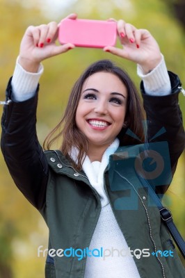 Beautiful Girl Taking A Selfie In Autumn Stock Photo