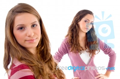 Beautiful Girls Standing In Front Of Camera Stock Photo