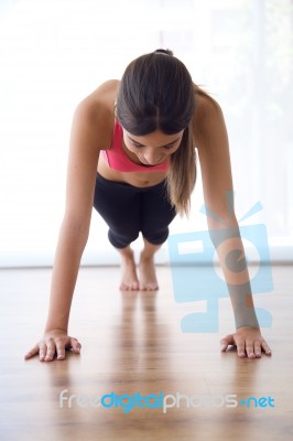 Beautiful Healthy Young Woman Doing Exercise At Home Stock Photo