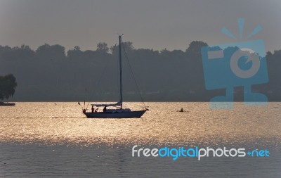 Beautiful Image Of A Lake And Boat On Sunset Stock Photo