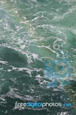 Beautiful Isolated Photo With The Water Near Amazing Niagara Falls With A Rainbow Stock Photo