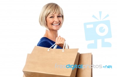 Beautiful Lady Carrying Shopping Bags Stock Photo