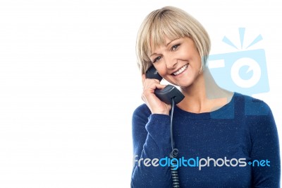 Beautiful Lady Holding Phone Receiver Stock Photo