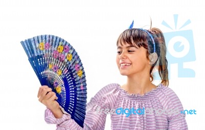 Beautiful Little Girl Holding A Fan Stock Photo