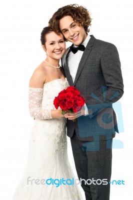 Beautiful New Bridegroom Smiles For The Camera Stock Photo