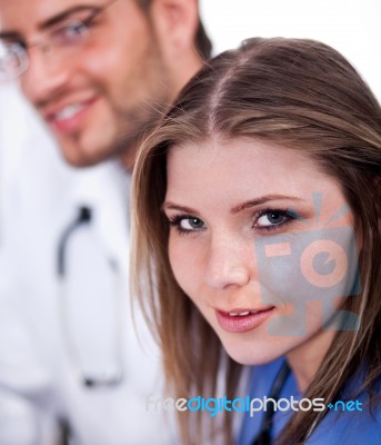 Beautiful Nurse Looking At You Stock Photo