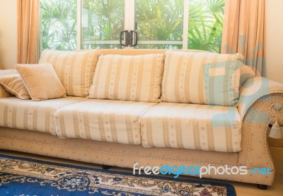 Beautiful Orange Sofa In Living Room Stock Photo