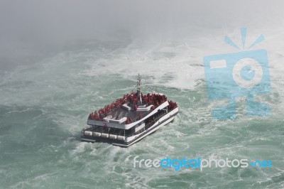 Beautiful Photo Of A Ship In The Mist Of The Amazing Niagara Falls Stock Photo