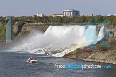 Beautiful Photo Of The Amazing Niagara Waterfall And A Ship Stock Photo