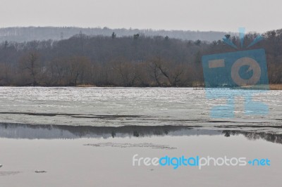 Beautiful Picture With A Lake And Forest In The Winter Time Stock Photo