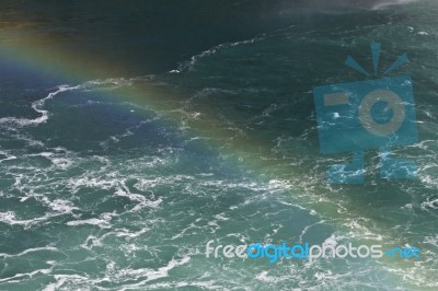 Beautiful Picture With The Water Near Amazing Niagara Falls With A Rainbow Stock Photo