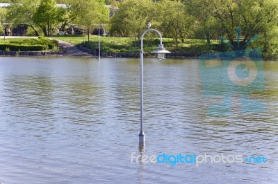 Beautiful Postcard With A Lights Posts In Water Stock Photo