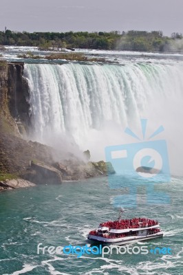 Beautiful Postcard With A Ship And Amazing Niagara Waterfall Stock Photo