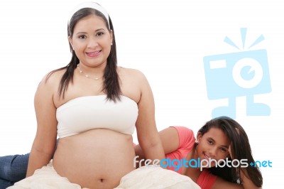 Beautiful Pregnant Woman With Her Daughter Stock Photo