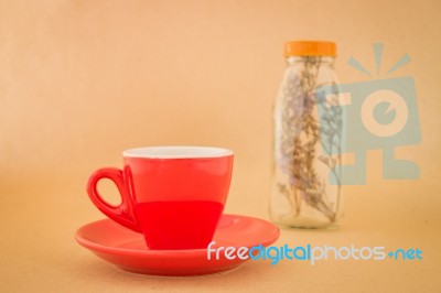 Beautiful Red Coffee Cup On Romantic  Table Stock Photo