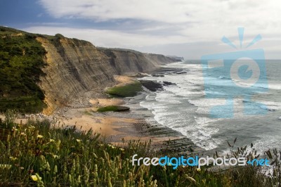 Beautiful Rocky Beach Of Magoito, Located In Sintra, Portugal Stock Photo