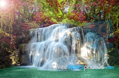 Beautiful Scenic Of Waterfall With Autumn Forest Stock Photo