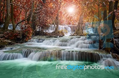 Beautiful Scenic Of Waterfall With Autumn Forest Stock Photo