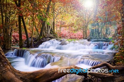 Beautiful Scenic Of Waterfall With Autumn Forest Stock Photo