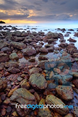 Beautiful Seascape Of Wave And Rock When The Sunset Stock Photo