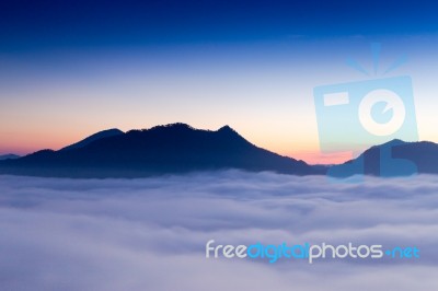 Beautiful Sun Rise At Pho Tog Mountain And The Mist In Thailand Stock Photo