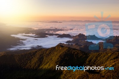 Beautiful Sun Rise On Top Mountain With Could Stock Photo