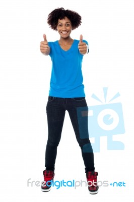 Beautiful Trendy Woman Showing Double Thumbs Up Stock Photo