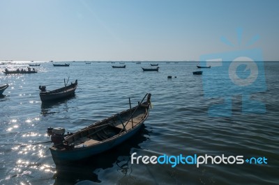 Beautiful View Of Fishing Boats Sailing In The Sea In Dusk Sunset Twilight Time Stock Photo