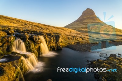 Beautiful Waterfall With Huge Mountain In Iceland Stock Photo