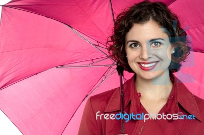 Beautiful Woman Holding An Open Umbrella Stock Photo