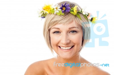 Beautiful Woman In Wreath Of Flowers Stock Photo