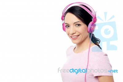 Beautiful Woman Listening Music Stock Photo