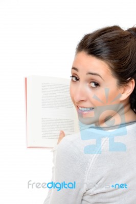 Beautiful Woman Smiling And Reading A Book Stock Photo