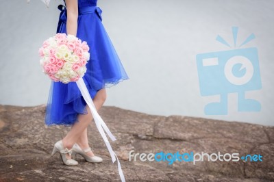 Beautiful Woman Wear Blue Evening Dress Hold A Bouquet Of Flower… Stock Photo