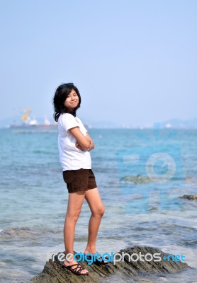 Beautiful Young Asian Woman On Beach Stock Photo