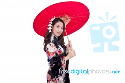 Beautiful Young Asian Woman Wearing Traditional Japanese Kimono With Red Umbrella Isolated On White Background Stock Photo