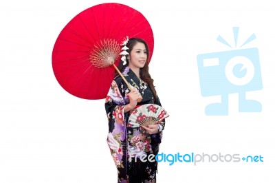 Beautiful Young Asian Woman Wearing Traditional Japanese Kimono With Red Umbrella Isolated On White Background Stock Photo